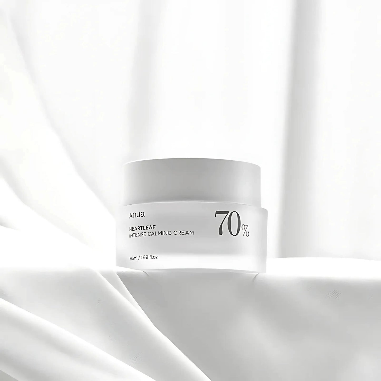 ANUA Heartleaf 70% Intense Calming Cream sobre fundo branco elegante – creme coreano hidratante e calmante com 70% de heartleaf, ideal para pele sensível e reativa, cosmética coreana, skincare k-beauty Portugal