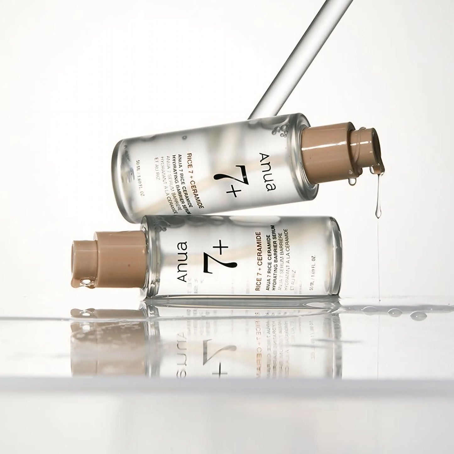 ANUA Rice 7 Ceramide Hydrating Barrier Serum em composição dupla com líquido a escorrer – textura leve e hidratante, ideal para pele seca ou fragilizada, cosmética coreana, skincare k-beauty Portugal