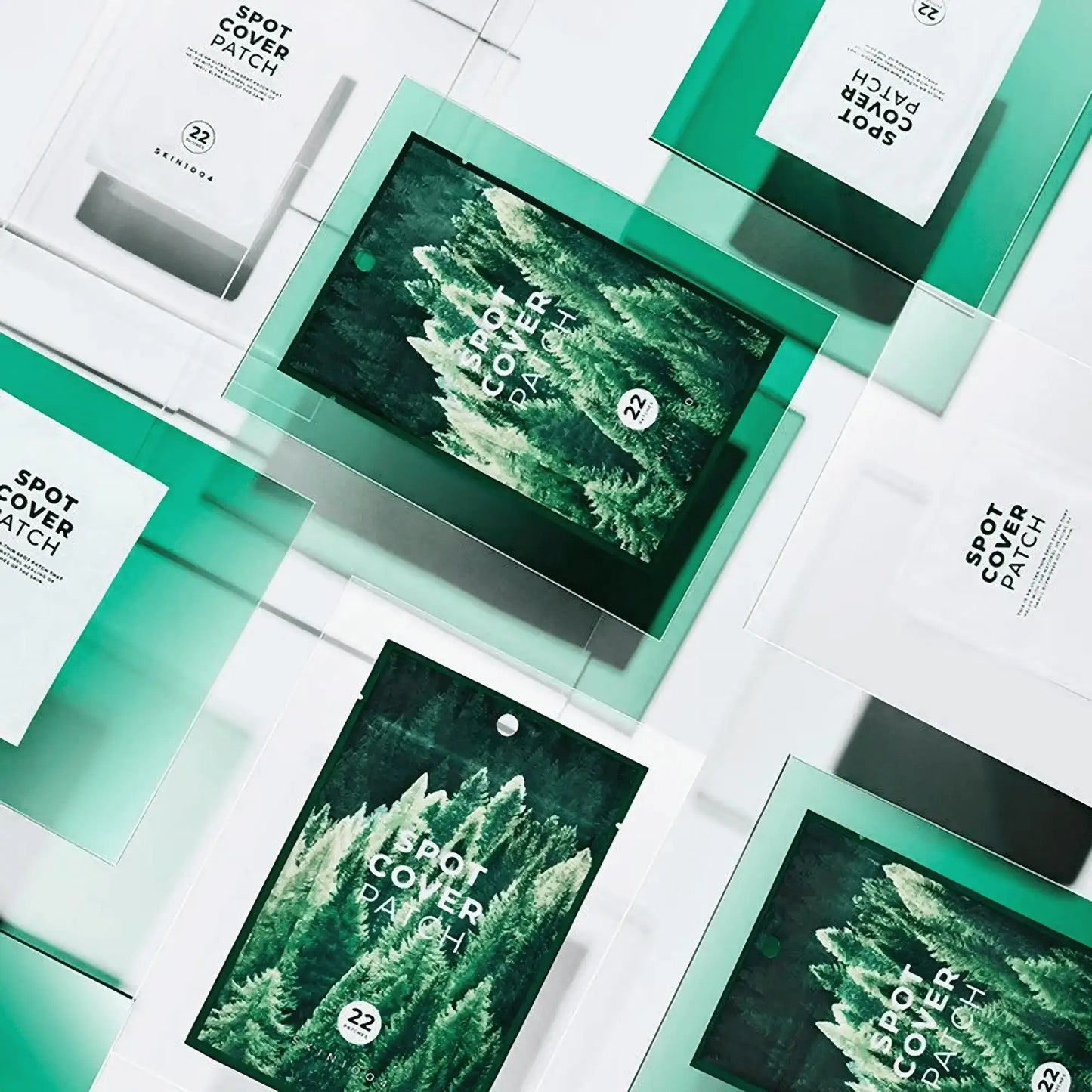 SKIN1004 Madagascar Centella Tea-Trica Spot Cover Patch — várias embalagens empilhadas com visual verde vibrante, ideais para tratamento localizado. Cosmética coreana e skincare k-beauty Portugal.