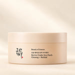 Beauty of Joseon Revive Under Eye Patch Ginseng + Retinal, embalagem de patches para olhos sobre fundo creme.