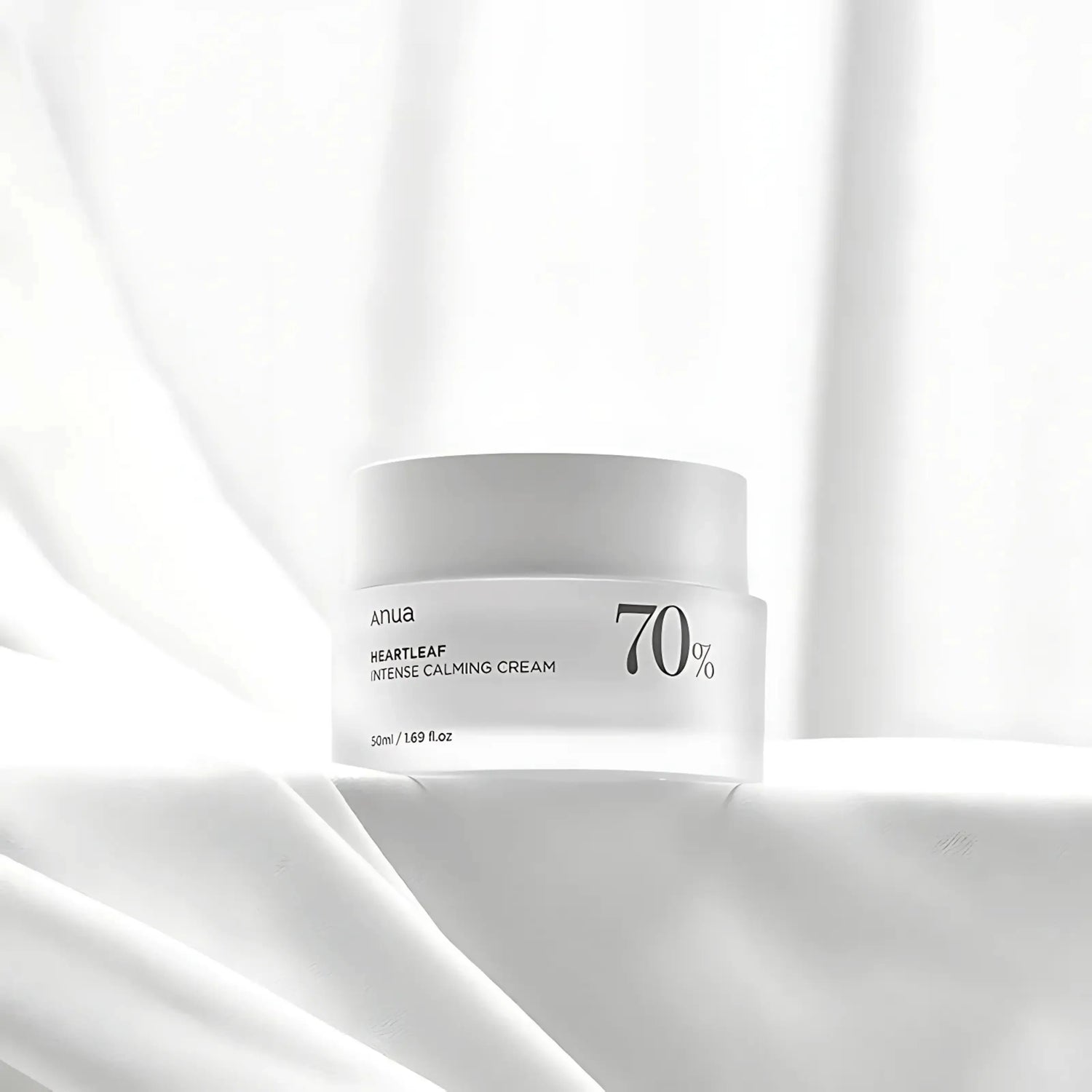 ANUA Heartleaf 70% Intense Calming Cream sobre fundo branco elegante – creme coreano hidratante e calmante com 70% de heartleaf, ideal para pele sensível e reativa, cosmética coreana, skincare k-beauty Portugal