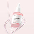 PDRN Pink Peptide Face Serum da medicube frasco com pipeta em fundo rosa