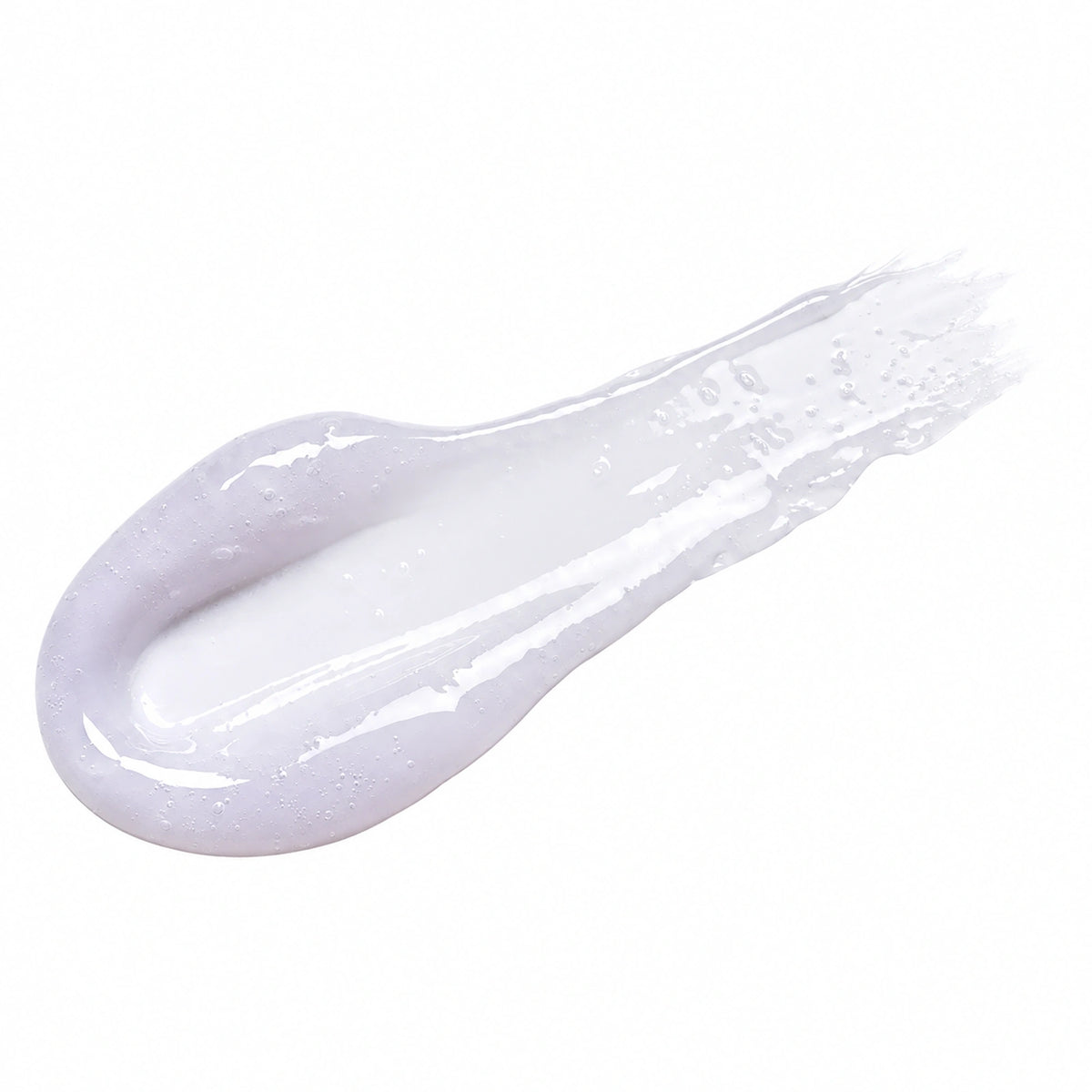 Textura em bálsamo da máscara labial TOCOBO Collagen Boosting Lip Mask espalhada sobre fundo branco.